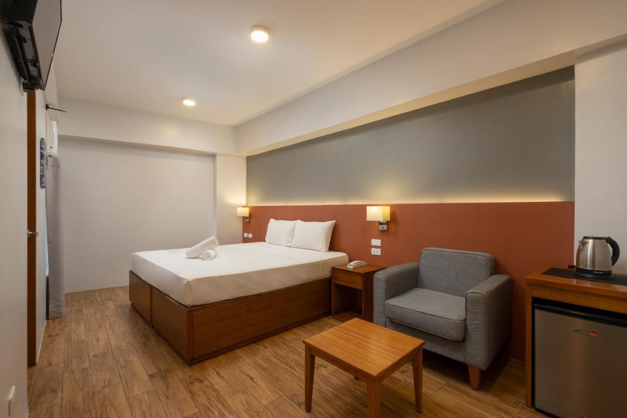 Ihotel Uptown Bgc Тагиг Экстерьер фото