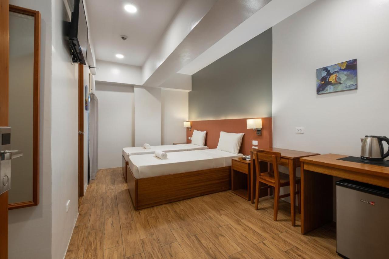 Ihotel Uptown Bgc Тагиг Экстерьер фото
