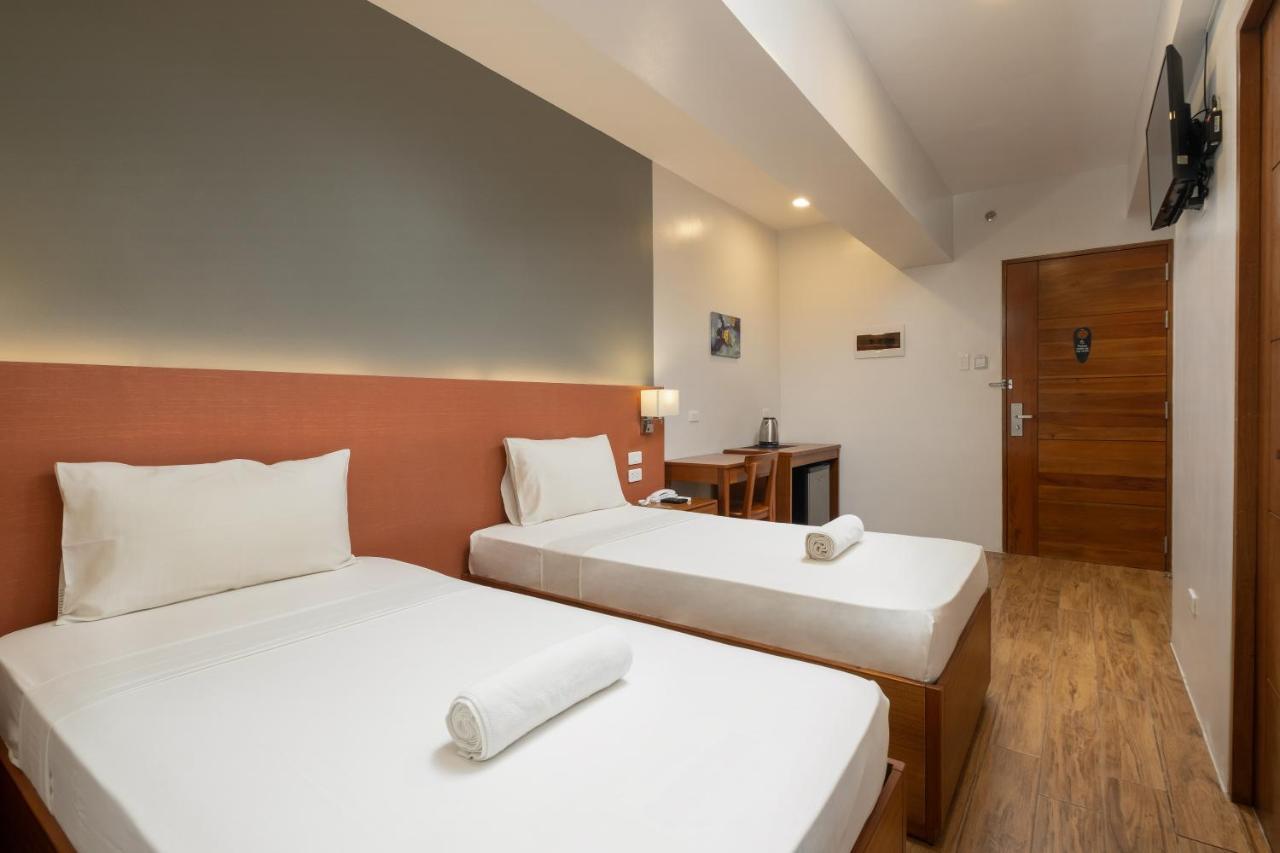 Ihotel Uptown Bgc Тагиг Экстерьер фото